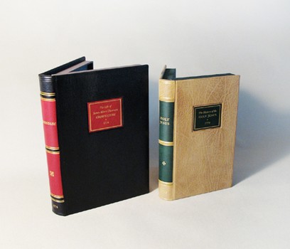 2L-08. Two full leather boxes with leather labels